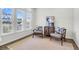 Bright and airy sitting room with large windows, comfortable seating, and stylish decor at 3524 Great Egret Dr, Johns Island, SC 29455
