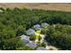 Aerial view of multiple homes surrounded by lush trees at 3574 Toomer Kiln Cir, Mount Pleasant, SC 29466