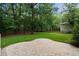 View of backyard with large patio and a lawn area, perfect for outdoor entertaining at 3574 Toomer Kiln Cir, Mount Pleasant, SC 29466