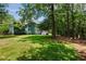Enjoy the serenity of a spacious backyard shaded by mature trees, offering privacy and a tranquil escape at 3574 Toomer Kiln Cir, Mount Pleasant, SC 29466