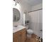 Cozy bathroom features a modern vanity and a shower with a decorative curtain at 3574 Toomer Kiln Cir, Mount Pleasant, SC 29466