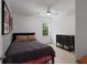 Neutrally decorated bedroom with large window and minimalist decor creating a tranquil space at 3574 Toomer Kiln Cir, Mount Pleasant, SC 29466