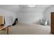 Spacious bonus room with carpet and a vaulted ceiling offers versatility for various activities at 3574 Toomer Kiln Cir, Mount Pleasant, SC 29466
