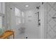 Modern bathroom features glass enclosed walk-in shower with tile surround and built-in bench at 377 Lofton Ct, McClellanville, SC 29458
