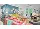 Comfortable living room with natural light, stylish furnishings, and access to outdoor space at 3798 Sawmill Ct, Mount Pleasant, SC 29429