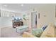 Bright living room with beachy decor, tv, and access to another room at 3798 Sawmill Ct, Mount Pleasant, SC 29429