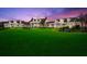 Expansive clubhouse with a manicured lawn, classic architecture, and beautiful outdoor spaces at 40 Greensward Rd, Kiawah Island, SC 29455