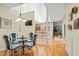 Bright dining area with skylight and hardwood floors, open to the living spaces of the home at 40 Greensward Rd, Kiawah Island, SC 29455