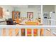 Dining area with hardwood floors, a large table, and a view of the living area at 40 Greensward Rd, Kiawah Island, SC 29455