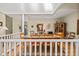 Dining room with hardwood floors, a large wooden table, and a skylight providing natural light at 40 Greensward Rd, Kiawah Island, SC 29455