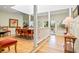 Dining room with hardwood floors, skylight, and a view to the outdoor space at 40 Greensward Rd, Kiawah Island, SC 29455