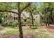 Charming exterior view of the home with mature landscaping and a cozy facade at 40 Greensward Rd, Kiawah Island, SC 29455