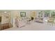 Cozy living room with comfortable seating, staircase, and neutral tones at 40 Greensward Rd, Kiawah Island, SC 29455