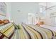 Bright main bedroom featuring vaulted ceilings, a comfortable bed and soft carpet at 40 Greensward Rd, Kiawah Island, SC 29455