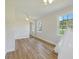 Spacious bedroom with hardwood floors, two bright windows, and a teepee to create a warm, inviting atmosphere at 400 Black Oak Rd, Bonneau, SC 29431