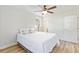 Cozy bedroom with wood floors, neutral walls, and a classic ceiling fan, perfect for restful nights at 400 Black Oak Rd, Bonneau, SC 29431