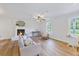 Spacious living room with a charming fireplace and stylish furniture at 400 Black Oak Rd, Bonneau, SC 29431