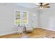 Cozy sitting area featuring large windows and modern flooring at 400 Black Oak Rd, Bonneau, SC 29431