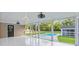 Relaxing screened patio with a view of the private swimming pool at 400 Black Oak Rd, Bonneau, SC 29431