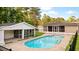 Inviting pool with screened-in porch and ample outdoor living space perfect for entertaining Gathering and friends at 400 Black Oak Rd, Bonneau, SC 29431