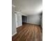 Open-concept living room boasting hardwood floors and neutral paint, creating a bright and airy space at 415 Parkdale Dr # 6D, Charleston, SC 29414