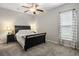 Cozy bedroom with a comfortable bed, bedside tables, and a bright window at 423 Sanctuary Park Dr, Summerville, SC 29486