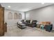 Open-concept living room featuring a plush gray sofa and neutral decor at 423 Sanctuary Park Dr, Summerville, SC 29486