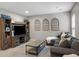 Comfortable living room with gray walls and entertainment center at 423 Sanctuary Park Dr, Summerville, SC 29486