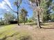 Spacious backyard with a shed, shelter, and a charming house, offering a blend of functionality and comfort at 4589 Prices Bridge Ln, Walterboro, SC 29488
