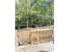 View from the deck featuring a fenced backyard and lush trees at 4589 Prices Bridge Ln, Walterboro, SC 29488
