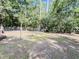 The large backyard features a chain link fence and ample space at 4589 Prices Bridge Ln, Walterboro, SC 29488
