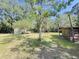 Spacious green backyard featuring a shed and charming home, perfect for enjoying outdoor living and relaxing at 4589 Prices Bridge Ln, Walterboro, SC 29488