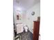 Compact bathroom with vanity, toilet, and decorative accents at 4589 Prices Bridge Ln, Walterboro, SC 29488