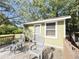 Charming house with two chairs on the wooden porch at 4589 Prices Bridge Ln, Walterboro, SC 29488
