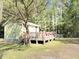 Inviting home exterior featuring a lovely deck area, ideal for outdoor entertainment and leisure at 4589 Prices Bridge Ln, Walterboro, SC 29488