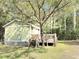 Charming home exterior with a well-maintained lawn and a spacious deck perfect for relaxing at 4589 Prices Bridge Ln, Walterboro, SC 29488