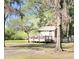 Exterior of a cute cottage with a deck at 4589 Prices Bridge Ln, Walterboro, SC 29488