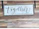 This wall decor states 'Together is our favorite place to be.' at 4589 Prices Bridge Ln, Walterboro, SC 29488
