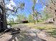 Large yard with a creek, cottage, and barn at 4589 Prices Bridge Ln, Walterboro, SC 29488