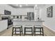 Spacious kitchen with a large island, stainless steel appliances, and stylish stools at 493 Trotters Ln, Moncks Corner, SC 29461