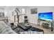 Inviting living room featuring modern decor, stairway, dark sofa and accent chair, perfect for relaxation at 493 Trotters Ln, Moncks Corner, SC 29461