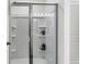 Modern stand up shower with sliding glass door and storage shelves at 493 Trotters Ln, Moncks Corner, SC 29461