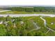 Expansive marshland views surround a waterfront home and wooden walkway leading to a pier at 510 Traders Aly, Mount Pleasant, SC 29464