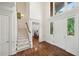 Grand foyer featuring high ceilings, hardwood floors, and a staircase at 510 Traders Aly, Mount Pleasant, SC 29464