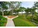 Landscaped walking path leading to a waterfront view at 510 Traders Aly, Mount Pleasant, SC 29464