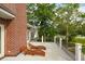 Expansive outdoor deck featuring brick detail and wooden lounge chairs, perfect for relaxing outdoors at 510 Traders Aly, Mount Pleasant, SC 29464
