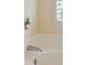 Relaxing bathtub with a chrome faucet and pristine white tile at 518 Cecilia Cove Dr, Charleston, SC 29412