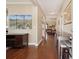 Inviting entryway with hardwood floors, neutral walls, and views into other rooms of the home at 518 Cecilia Cove Dr, Charleston, SC 29412