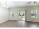 Bright dining area with modern floors and sliding glass door to the patio at 540 Truman Dr, Goose Creek, SC 29445