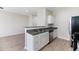 Kitchen featuring granite countertops and stainless steel appliances open to living room at 540 Truman Dr, Goose Creek, SC 29445